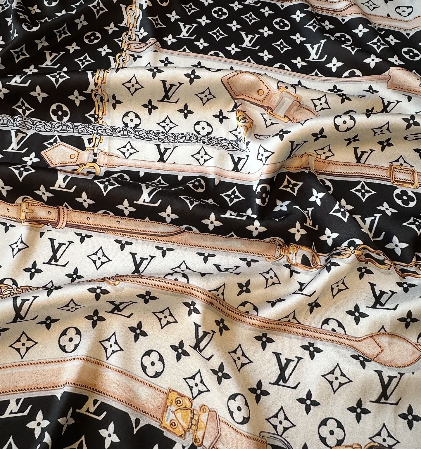 LV black chains & belts